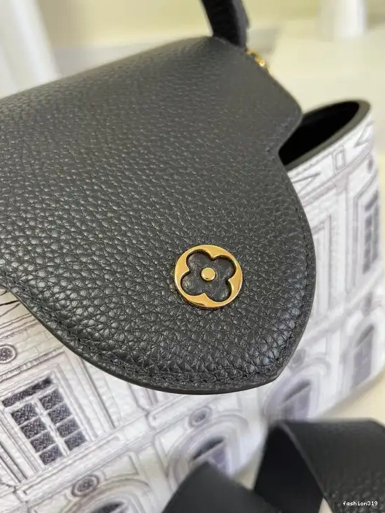 VUITTON LOUIS MM CAPUCINES 0317