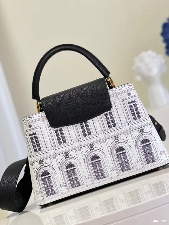 VUITTON LOUIS MM CAPUCINES 0317